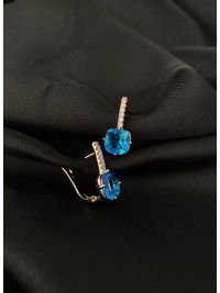 Сережки з блакитним стразом англійський замок золотого кольору 30721