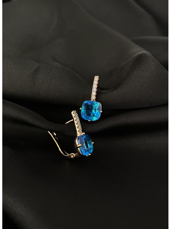 Сережки з блакитним стразом англійський замок золотого кольору 30721