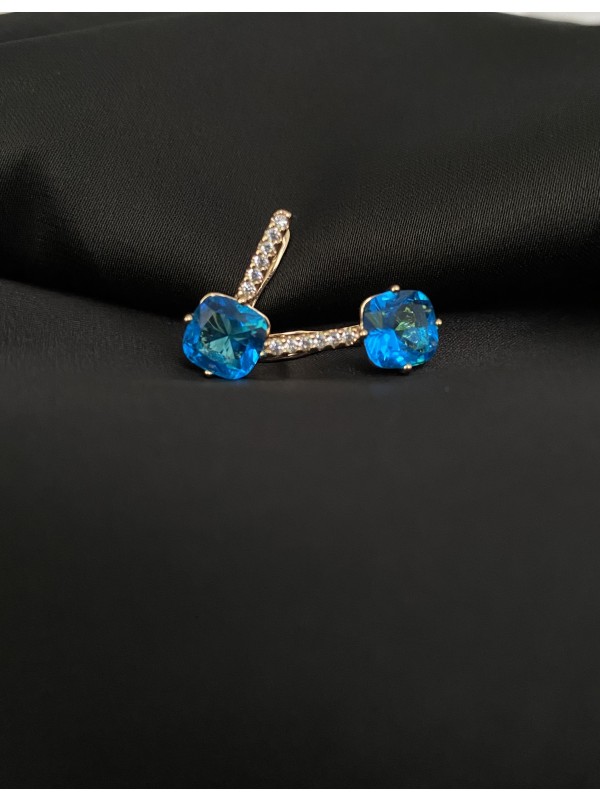 Сережки з блакитним стразом англійський замок золотого кольору 30721