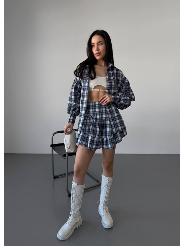 Жіночий костюм зі спідницею в клітку синього кольору 30784