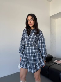 Жіночий костюм зі спідницею в клітку синього кольору 30784