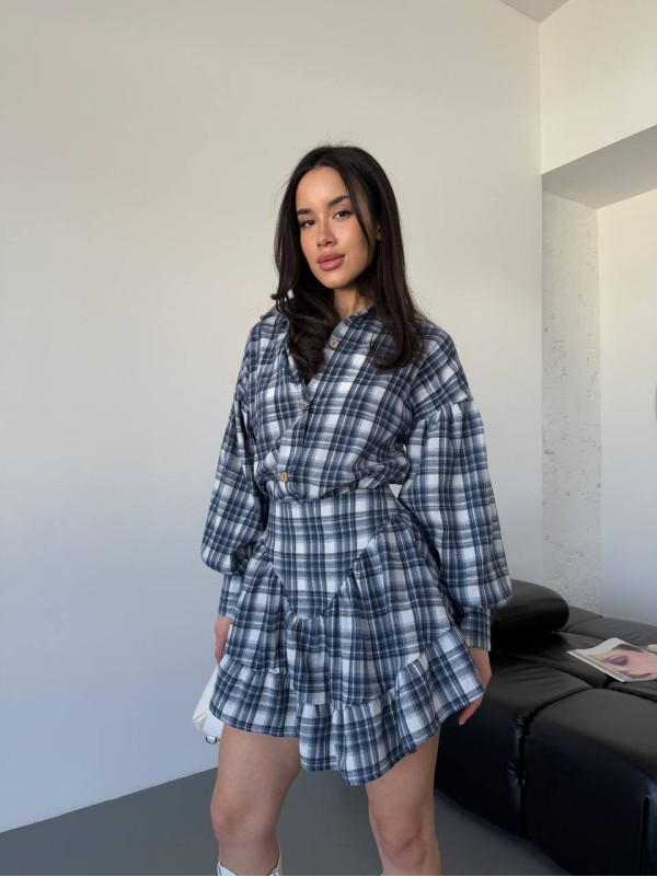 Жіночий костюм зі спідницею в клітку синього кольору 30784