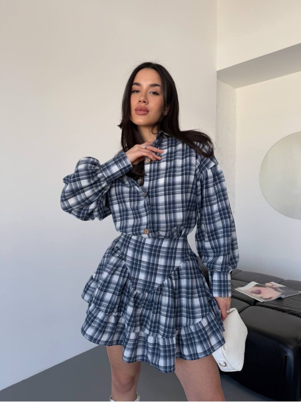 Жіночий костюм зі спідницею в клітку синього кольору 30784