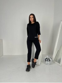 Легкий костюм для жінок чорного кольору 30836