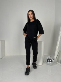Легкий костюм для жінок чорного кольору 30836