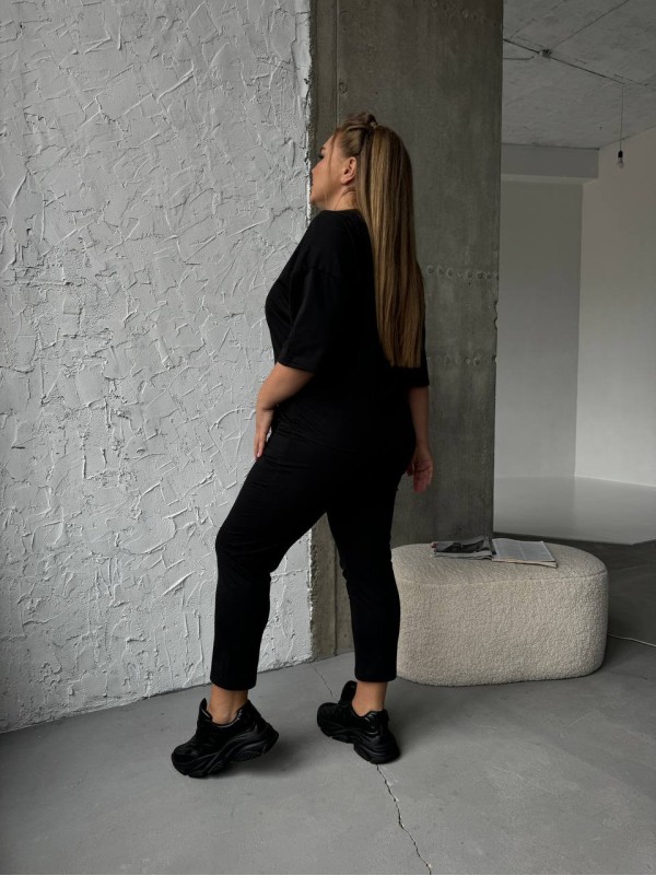 Легкий спортивний костюм чорного кольору 30942