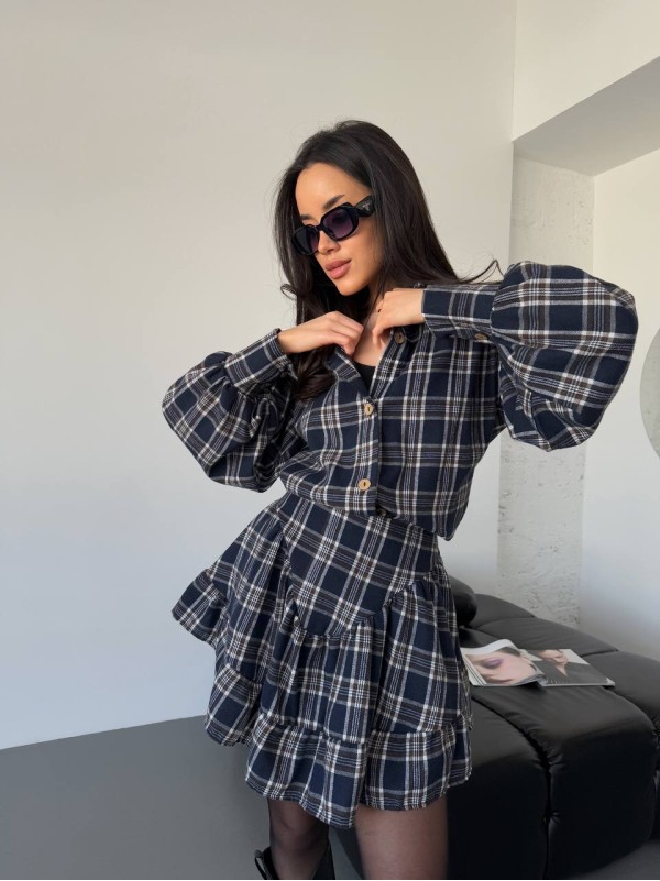 Жіночий костюм зі спідницею в клітку темно-синього кольору 31071