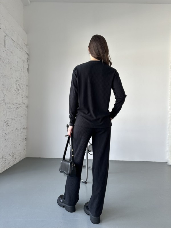 Жіночий прогулянковий костюм з трикотажу в рубчик чорного кольору 31198