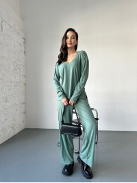 Жіночий прогулянковий костюм з трикотажу в рубчик фiсташкового кольору 31199