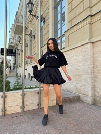 Жіноча легка спідниця міні чорного кольору 31220