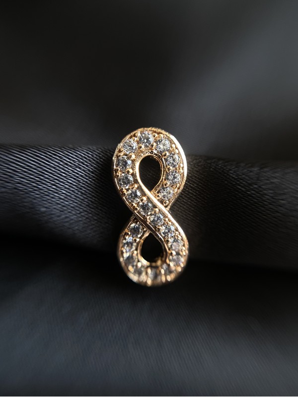 Сережки "Нескінченність" англійський замок золотого кольору з камінцями 31324