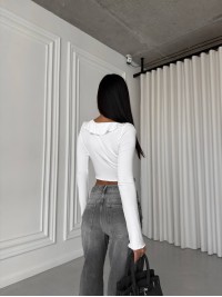 Жіночий топ із воланами на зав'язках молочного кольору 31661