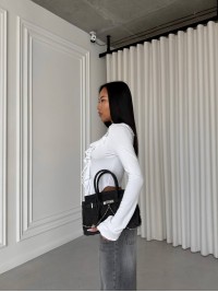 Жіночий топ із воланами на зав'язках молочного кольору 31661