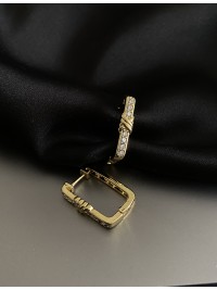 Сережки з камінчиками золотого кольору 31901