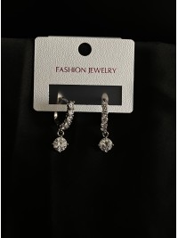 Сережки з камінням англійський замок срібного кольору 31902