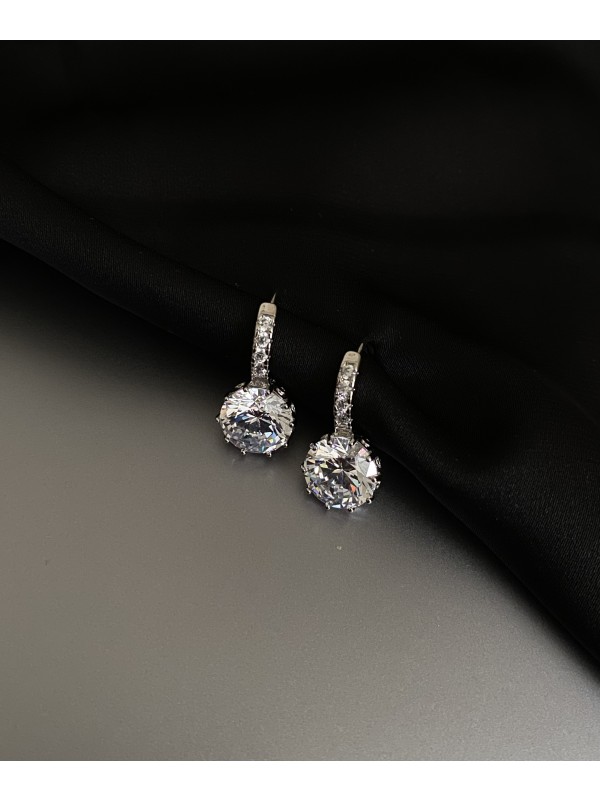 Сережки з великим камінчиком англійський замок срібного кольору 32086