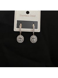 Сережки вкриті камінцями англійський замок золотого кольору 32122