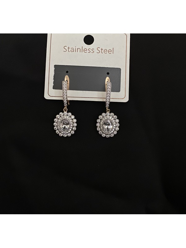 Сережки вкриті камінцями англійський замок золотого кольору 32122