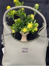 Жіноча сумка-багет з пористої еко-шкіри оливкового кольору 32371