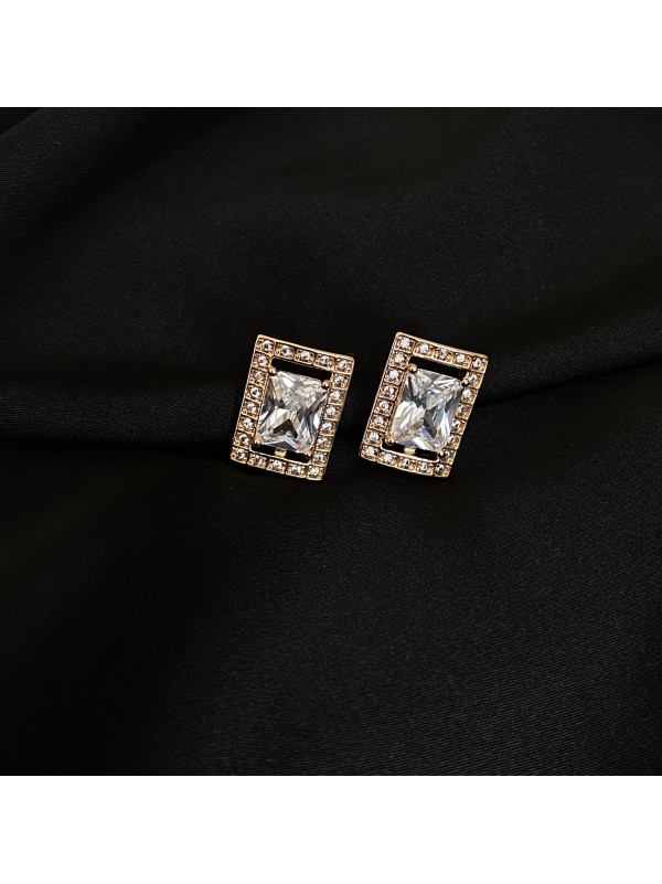 Сережки з великим каменем англійський замок золотого кольору 32427