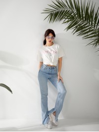 Жіноча футболка з малюнком молочного кольору 32553