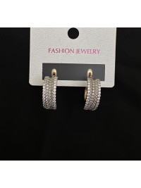 Сережки прогин з камінцями англійський замок золотого кольору 32597