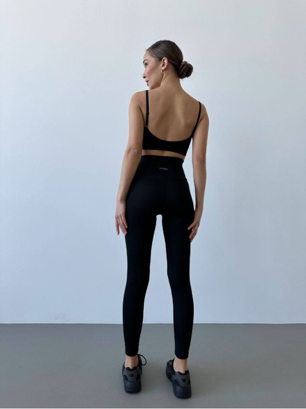 Жіночі лосини зі стягуючим ефектом чорного кольору 32652