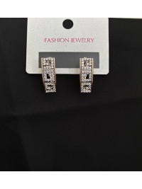 Сережки прямокутні з камінням золотого кольору англійський замок 32779