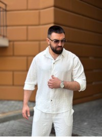 Чоловічий брючний костюм молочного кольору 33080