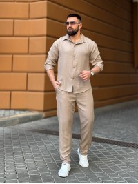 Чоловічий брючний костюм бежевого кольору 33081