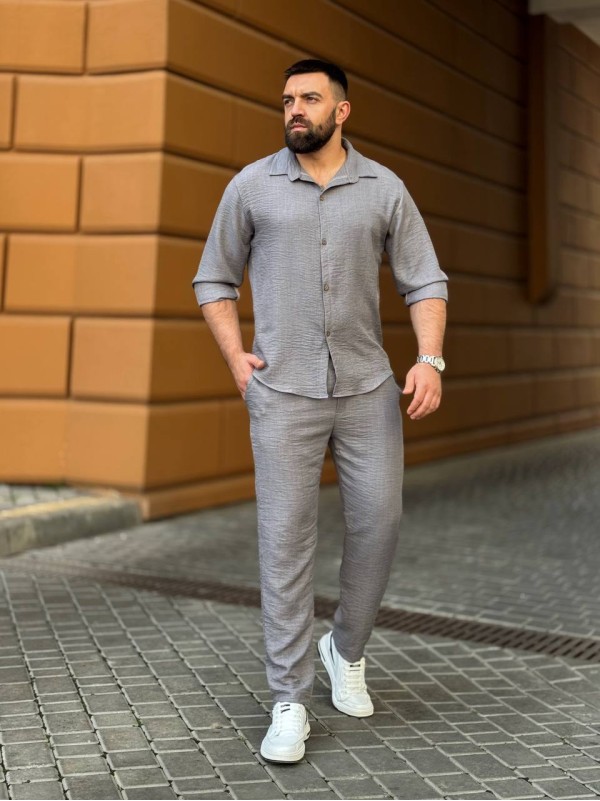 Чоловічий брючний костюм сiрого кольору 33083