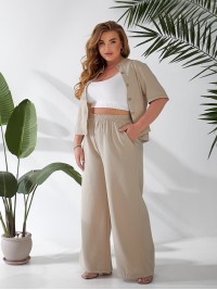 Жіночий легкий класичний костюм бежевого кольору 33134