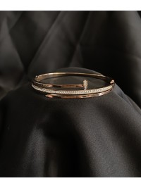 Браслет - манжет Цвях золотого кольору 33576