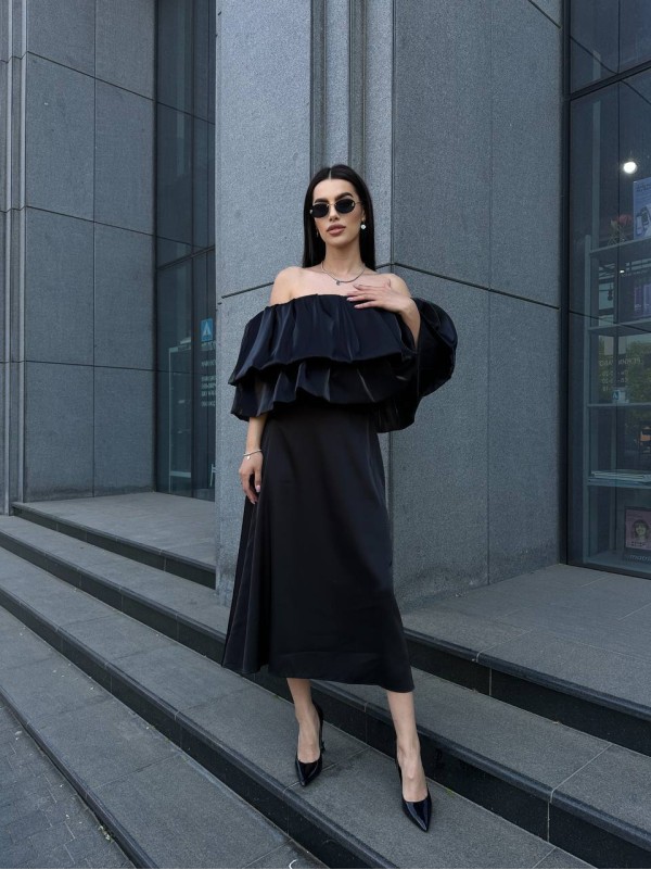 Жіноча шовкова спідниця міді чорного кольору 33191