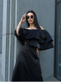 Жіноча шовкова спідниця міді чорного кольору 33191