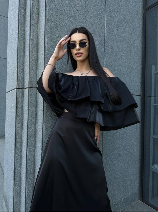 Жіноча шовкова спідниця міді чорного кольору 33191