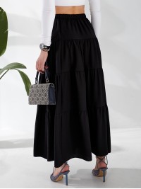 Жіноча льняна спідниця міді з воланами чорного кольору 33213