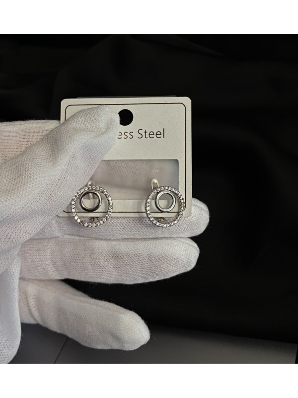 Сережки круглі з камінцями срібного кольору англійський замок 33353