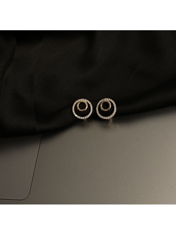 Сережки круглі з камінцями золотого кольору англійський замок 33354