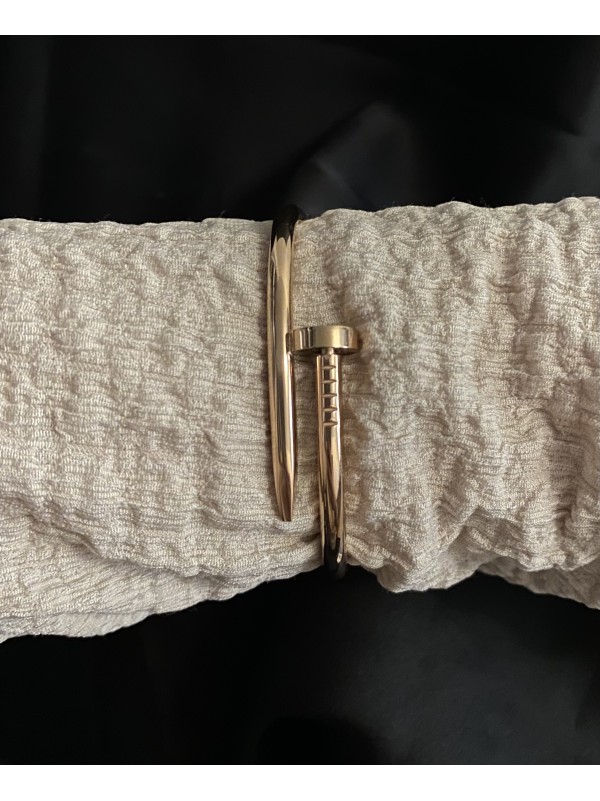 Браслет - манжет Цвях золотого кольору 33357