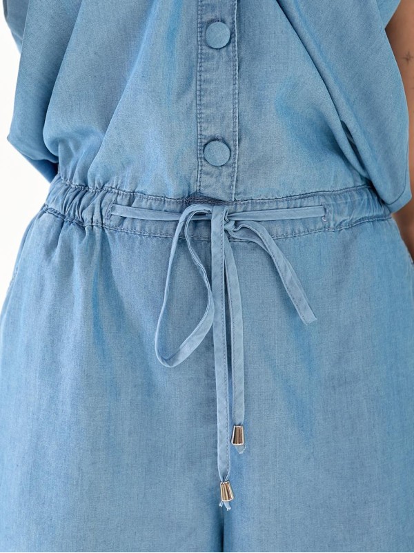 Жіночий джинсовий комбінезон синього кольору 33448