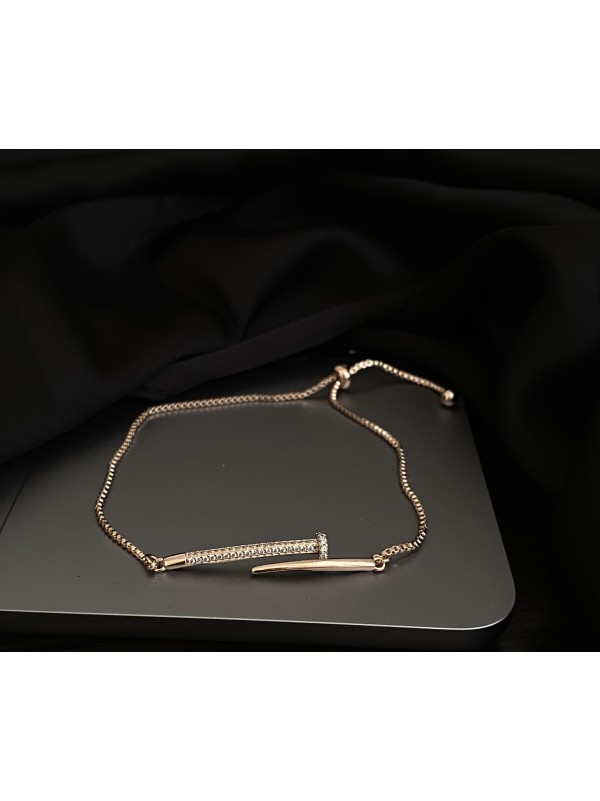 Браслет затяжка Цвях золотого кольору 33458