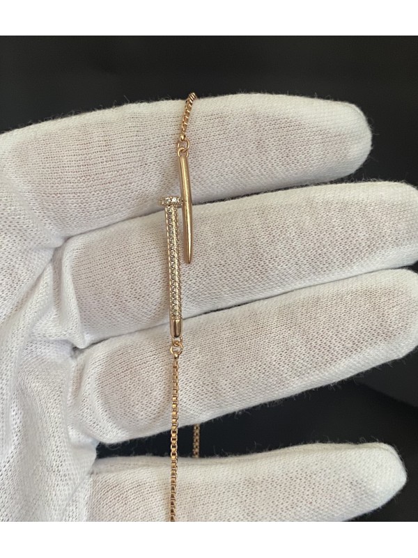 Браслет затяжка Цвях золотого кольору 33458