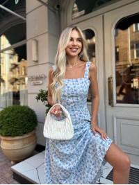 Літня сукня міді з відкритою спинкою блакитного кольору 33641