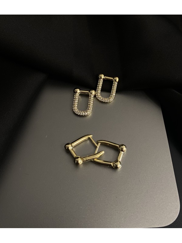 Сережки 2в1 з камінцями англійський замок золотого кольору 33746