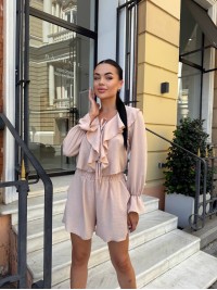 Яскравий прогулянковий костюм бежевого кольору 33786