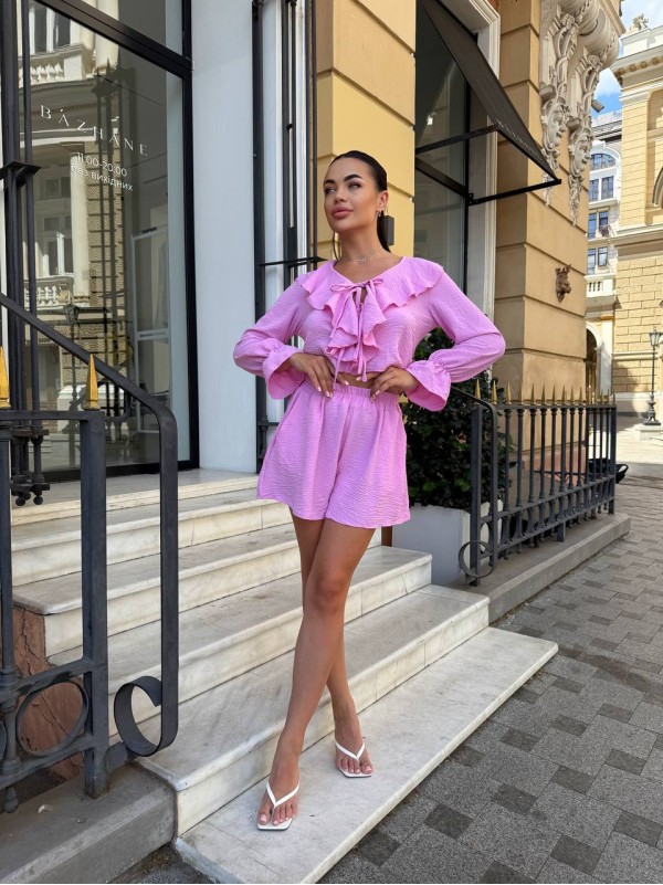 Яскравий прогулянковий костюм рожевого кольору 33788
