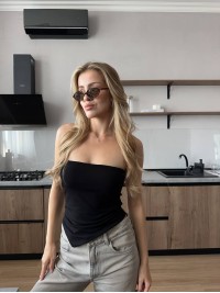 Жіночий топ з асиметричним краєм чорного кольору 33989