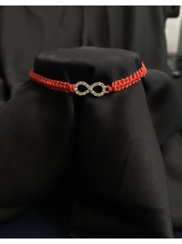 Червона нитка зі знаком безкінечності на затяжці 33996