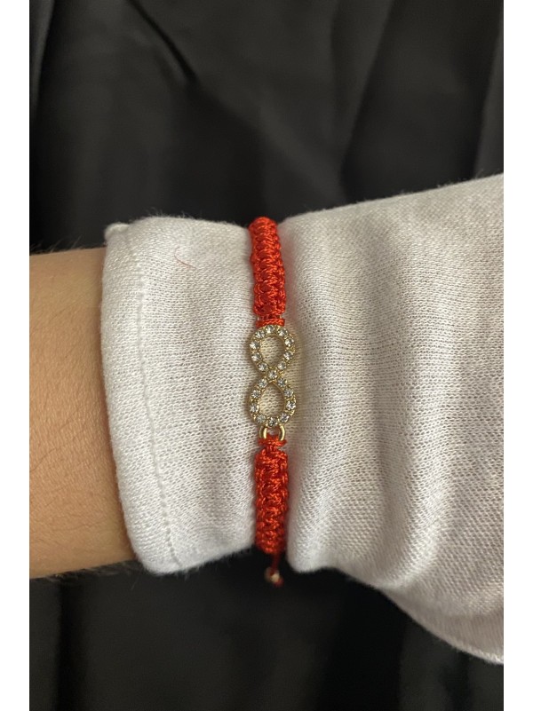 Червона нитка зі знаком безкінечності на затяжці 33996